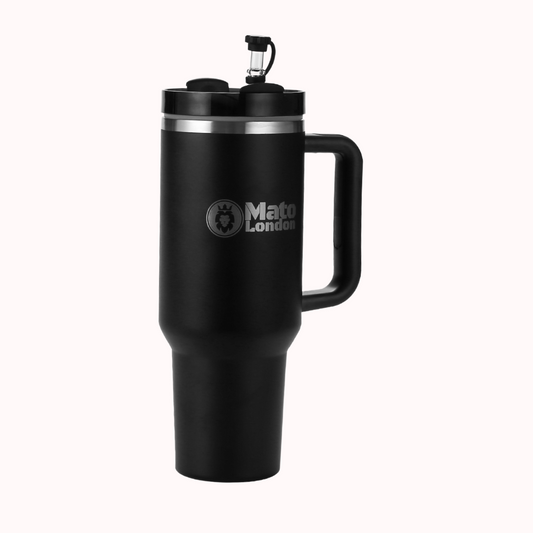 Black 40oz insulated tumbler with a leakproof rotating lid closed, standing upright