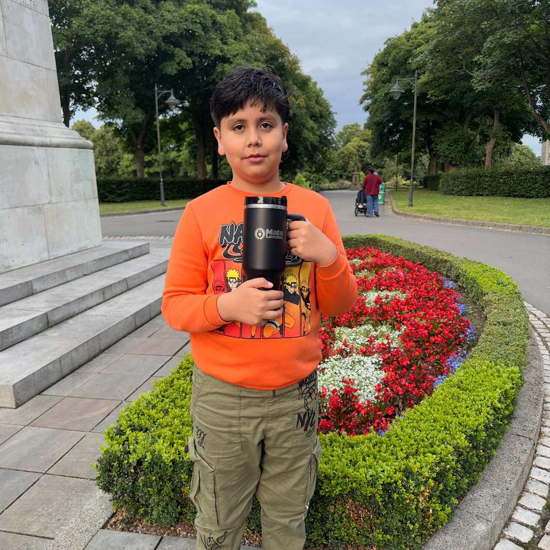 Stainless steel leakproof coffee cup by Mato London held outdoors

Mato London insulated travel mug shown in outdoor lifestyle photo